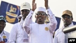 (FILES) Chad's transitional president and presidential election candidate Mahamat Idriss Deby Itno acknowledges the crowd at the Place des Nations during final presidential election campaign rally in N'Djamena on May 4, 2024.