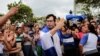 Opposition leader Yubrank Suazo, who according to local media was arrested for participating in a protest against Nicaraguan President Daniel Ortega's government, dances after being released from La Modelo Prison, in Masaya