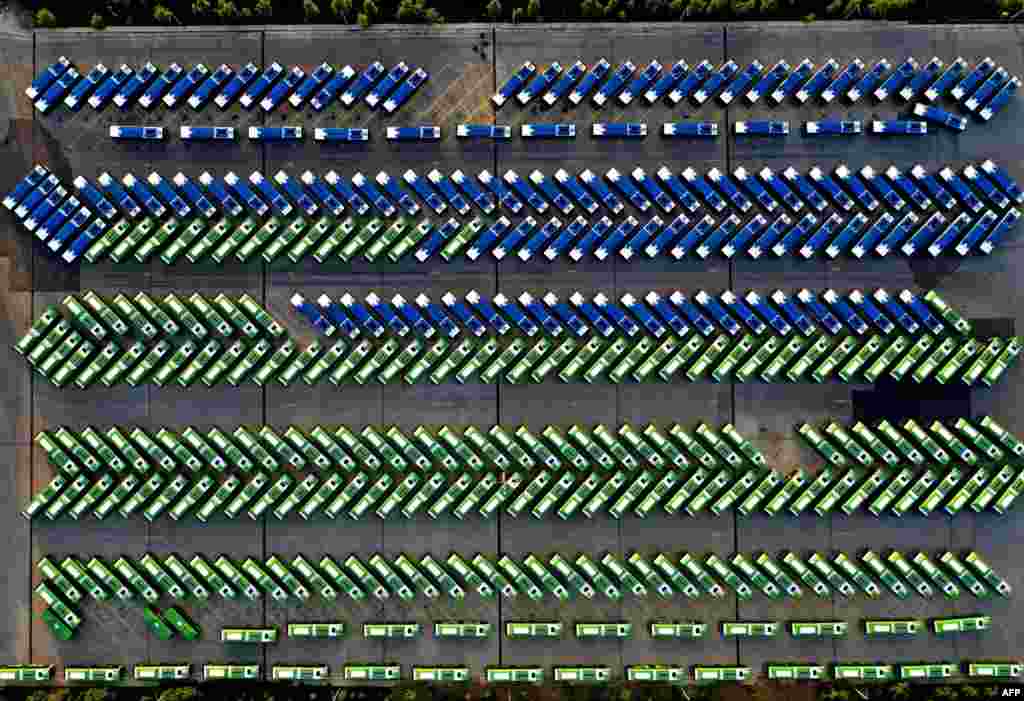 An aerial view shows city buses parked in the bus depot following the suspension of public transport services amid concerns about the spread of COVID-19, in Tbilisi, Georgia.