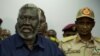 FILE - Sudan People Liberation Movement-North (SPLM-North) leader Malik Agar (L) speaks as Sudanese Deputy head of the Transitional Military Council, General Mohamed Hamdan Daglo (R), looks on during a press conference in Juba, South Sudan, July 27, 2019.