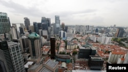 FILE - A view of the central business district in Singapore July 11, 2023. 