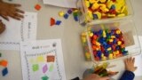 Preschool students practice math using manipulatives at a public school in Boston in 2016. (Lillian Mongeau/The Hechinger Report via AP)