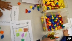 Preschool students practice math using manipulatives at a public school in Boston in 2016. (Lillian Mongeau/The Hechinger Report via AP)