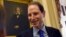 FILE - Sen. Ron Wyden, D-Ore. talks with a reporter before the start of a meeting with Senate Democrats on Capitol Hill in Washington, May 22, 2015. 