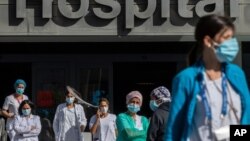 Petugas medis menuntut perbaikan sistem layanan kesehatan dalam aksi di Madrid, Spanyol (foto: dok).