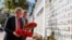 U.S. National Security Adviser John Bolton and U.S. Embassy Charge d'Affairs William Taylor attend a wreath-laying ceremony at the memorial for soldiers killed in a recent conflict in eastern Ukraine, in Kyiv, Ukraine, Aug. 27, 2019.