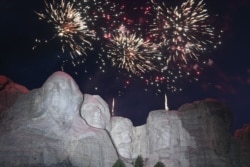 Fireworks explode above the Mount Rushmore National Monument during an Independence Day event attended by President Donald Trump in Keystone, South Dakota, July 3, 2020.