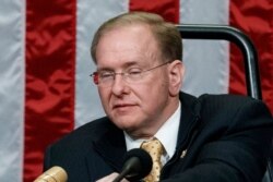 FILE - In this Jan. 3, 2019, file photo, Rep. Jim Langevin, D-R.I., prepares the dais after he was chosen as Speaker pro tempore for the opening day of the 116th Congress, at the Capitol in Washington.