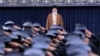 Iranian Supreme Leader Ayatollah Ali Khamenei listens to the national anthem as air force officers salute during their meeting in Tehran on Feb. 7, 2025. (Office of the Iranian Supreme Leader via AP)