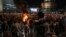 Israelis light a bonfire during a protest after Prime Minister Benjamin Netanyahu dismissed popular defense minister Yoav Gallant, in Tel Aviv, Israel, Nov. 5, 2024.