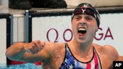 Katie Ledecky, of the United States, reacts after winning the women's 1500-meters freestyle final at the 2020 Summer Olympics, July 28, 2021, in Tokyo, Japan.