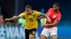 Le Belge Eden Hazard, à gauche, en duel avec l'Anglais Ruben Loftus-Cheek lors du match pour la troisième place entre l'Angleterre et la Belgique à la Coupe du monde de football 2018 au St Petersburg Stadium, Russie, 14 juillet 2018. 