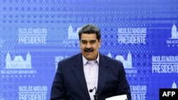 El conocido empresario Álex Saab ha sido acusado de estar relacionado con el presidente en disputa de Venezuela, Nicolás Maduro, quien aparece en esta foto, en temas de narcotráfico.