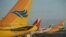 Pesawat Cebu Pacific (pertama, kiri), pesawat Philippines Airlines (kedua dari kiri) dan Cathay Pacific parkir di tarmac Bandara Internasional Manila, 2 November 2015. (Foto: Ted Aljibe/AFP Photo)