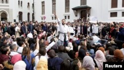 FILE - Algerian doctors, who are completing their residency stage of their studies, hold a sit-in protest in Algiers , Feb. 12, 2018. 