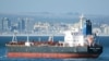 FILE - The Liberian-flagged oil tanker Mercer Street is seen off Cape Town, South Africa, Jan. 2, 2016. The oil tanker linked to an Israeli billionaire reportedly came under attack off the coast of Oman in the Arabian Sea, authorities said July 30, 2021.