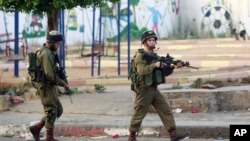 Izraelski vojnici tokom ranijih sukoba sa palestinskim demonstrantima