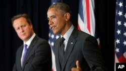 Britanski premijer Dejvid Kameron i predsednik Barak Obama na konferenciji za novinare u Briselu