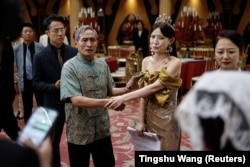 Actor Zhu Jian, 69, rehearses with other actors on the set of a micro drama (or movie) in Zhengzhou, China July 16, 2024. (Reuters/Tingshu Wang)