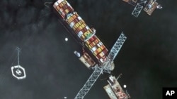 ARHIVA - Satelitski snimak srušenog mosta u Baltimoru (Foto: Satellite image ©2024 Maxar Technologies via AP)
