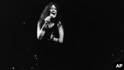 FILE- Folk-rock singer Janis Joplin performs in Dec. 1969 at an unknown location. 