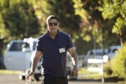 FILE - Kevin Mayer, then an executive at The Walt Disney Company, walks outside a conference venue in Sun Valley, Idaho, July 12, 2018. Mayer, who since took over as TikTok CEO, has announced he is quitting as chief of the wildly popular platform.