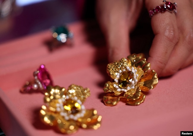 Jewelry produced from recycled and refined aluminum and sustainable lab-grown gemstones by jeweler, Anabela Chan are displayed in her boutique in London, Britain, December 13, 2023. (REUTERS/Hannah McKay)