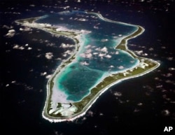 FILE - This image shows an aerial view of Diego Garcia. (U.S. Navy via AP)