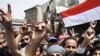 Anti-government protesters shout slogans during a demonstration demanding the resignation of Yemeni President Ali Abdullah Saleh, Sana'a, March 15, 2011