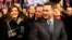 Leader of Macedonian ruling party VMRO-DPMNE and former Prime Minister Nikola Gruevski and his wife, Borkica, greet supporters during an election campaign rally in Ohrid, Macedonia, Nov. 21, 2016.