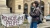 A "power to the people' sign in front of the Odeon theater, also an icon of the May 1968 protest movement.