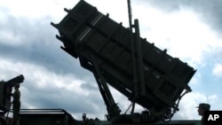 FILE - Taiwanese soldiers perform a launch preparation exercise on one of Taiwan's missile air defense systems. The State Department has approved arms sales to Taiwan worth a total of $1.4 billion.