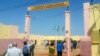 FILE - People enter the G5 Sahel force’s new military headquarters in Sevare, in central Mali, Oct. 22, 2017.