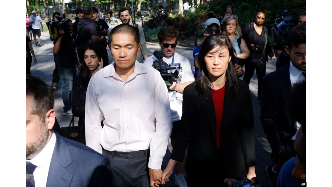 Linda Sun, a former aide to New York Governor Kathy Hochul, and her husband, Christopher Hu, leave Brooklyn Federal Court after their arraignment, Sept. 3, 2024, in New York.