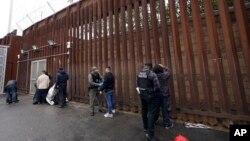 Ворота в пограничной стене недалеко от Сан-Диего (AP Photo/Gregory Bull, File)