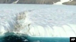 A massive ice island has broken off the coast of Greenland.