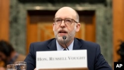 Russell Vought, President Donald Trump's choice for director of the Office of Management and Budget, appears before the Senate Budget Committee during a hearing examining his nomination, on Capitol Hill in Washington, Jan. 22, 2025. 