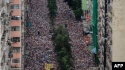 香港市民2019年6月9日举行空前规模的游行，抗议港府修订逃犯条例。