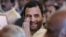 Congress party leader Rahul Gandhi greets a person attends the swearing-in ceremony for the new ministers in New Delhi, India, October 28, 2012. 