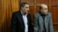 Iranian nationals Sayed Mansour Mousavi, left, and Ahmed Abolfathi Mohammed, right stand in the Nairobi magistrates court in Nairobi, Kenya, (File photo).