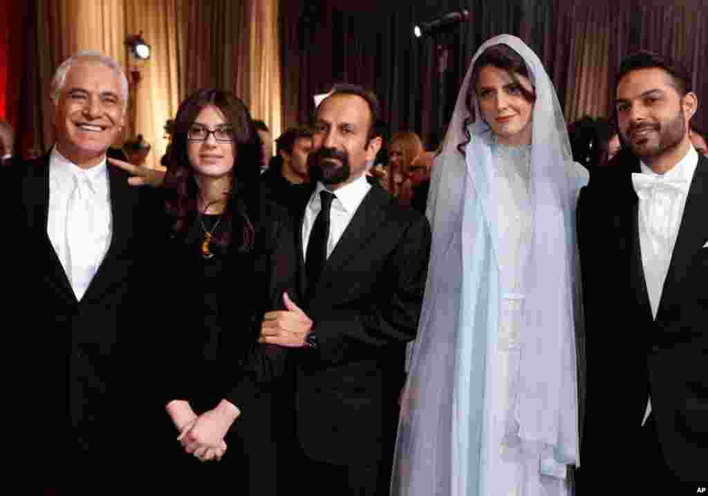 Director of Photography Mahmoud Kalari, actress Sarina Farhadi, her father, director Asghar Farhadi; actress Leyla Hatami and actor Peyman Moadi (L-R), from the film "A Separation," which won best foreign film. (Reuters)