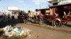 Piles of garbage, mostly plastic bags, are seen here having been left near Derm Kor Market in the morning of July 3, 2015. (Ouch Nida/VOA Khmer)