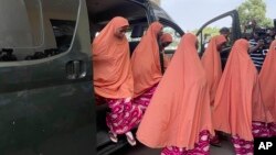 FILE - Freed students of the LEA Primary and Secondary School Kuriga leave a van upon arrival at the government house in Kaduna, Nigeria, Monday, March 25, 2024. 