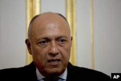 FILE - Egypt's Foreign Minister Sameh Shoukry speaks during a press conference in Cairo, Sept. 17, 2019.