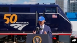 President Joe Biden speaks during an event to mark Amtrak's 50th anniversary at 30th Street Station in Philadelphia, April 30, 2021. 