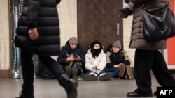 Residents take shelter in a metro station during an airstrike alarm in Kyiv, Ukraine, on Dec. 31, 2024.