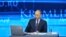 Russian President Vladimir Putin takes part in a live broadcast nationwide phone-in in Moscow, April 25, 2013. 