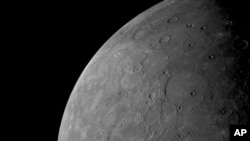 This image provided by European Space Agency shows close-up photos of Mercury showing northern plains taken by the European-Japanese spacecraft BepiColombo. (European Space Agency via AP)