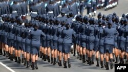 FILE - Sri Lankan military personnel march during the country's 66th Independence Day celebrations in the central town of Kegalle, about 40 kms from the capital Colombo.