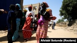 Des chrétiennes après un culte religieux, à Maiduguri, au Nigeria, le 17 février 2019.